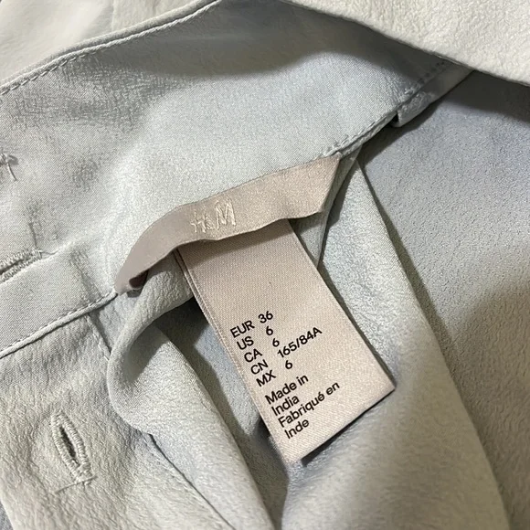 H & M Beautiful long sleeve Light Blue blouse. - Picture 9 of 11